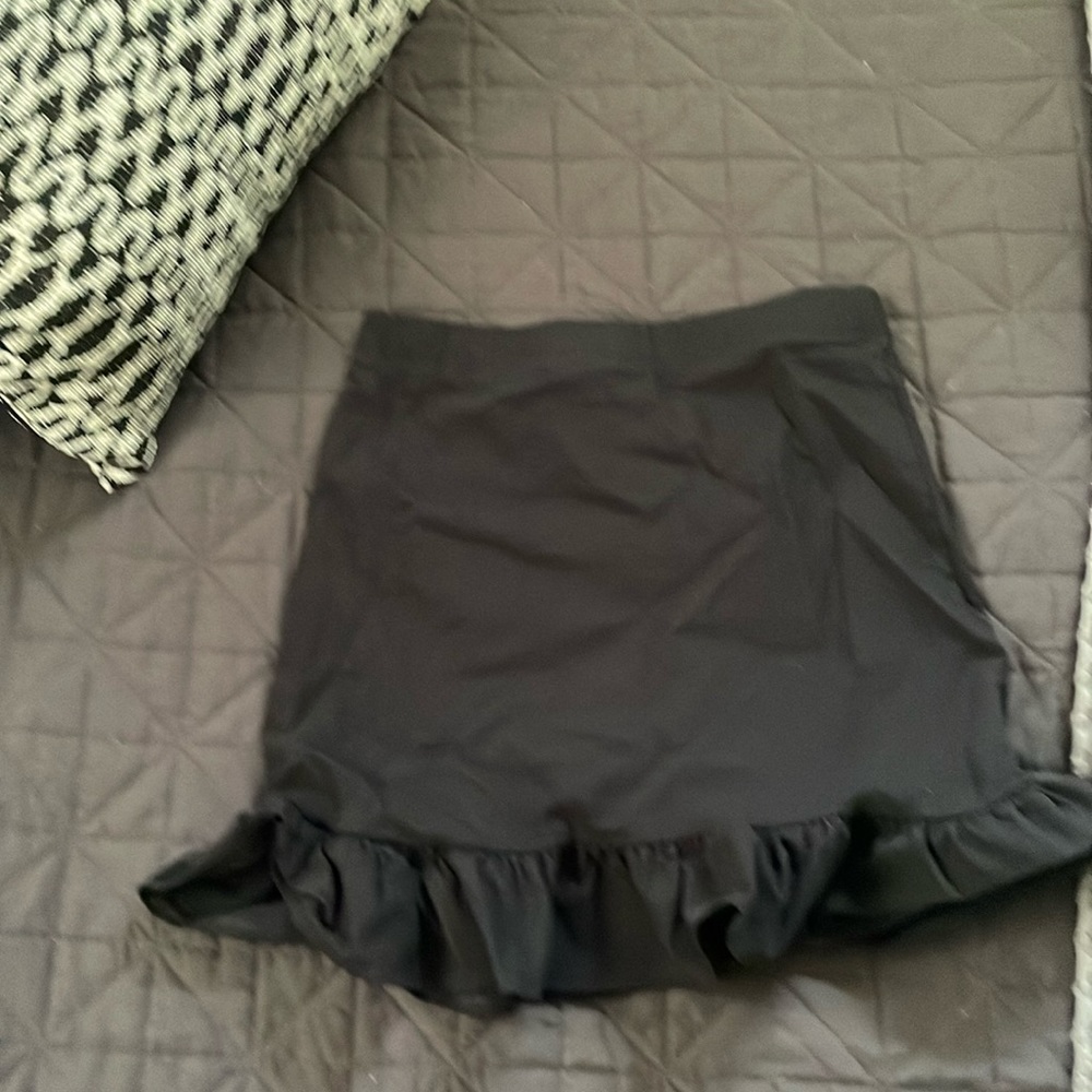 Black ruffle hem mini skirt
